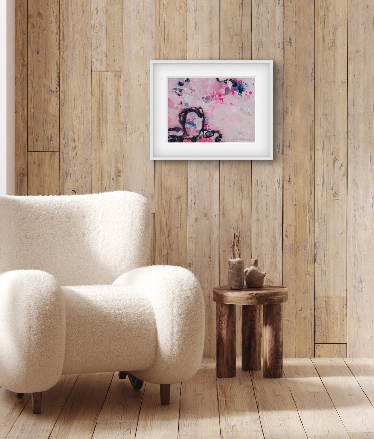 A framed image of the original painting "You Could Be My Flamingo" hangs on a wall above a side table.