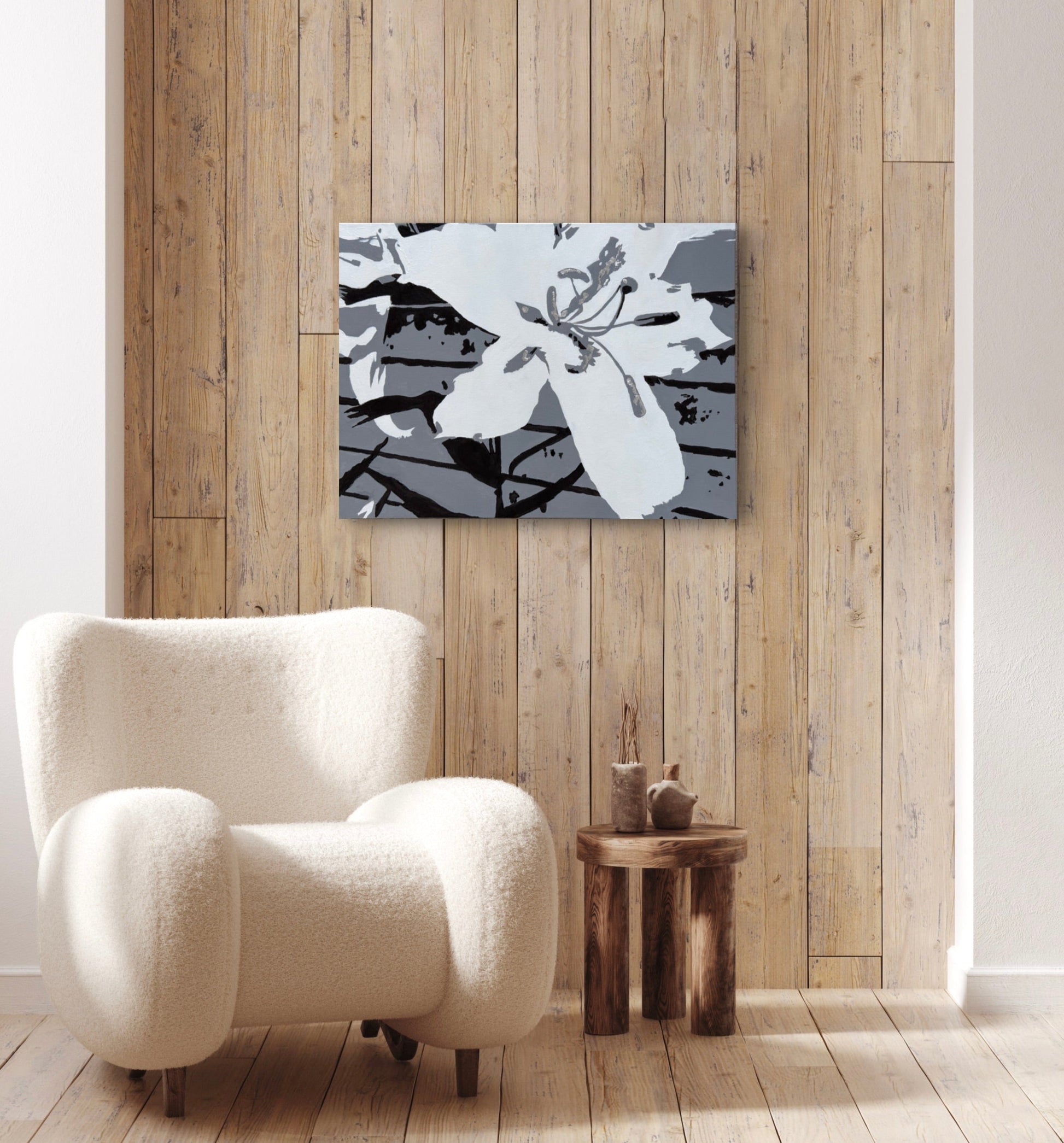 An in situ image of the artwork "Casablanca" hanging on a wall above a chair and side table.