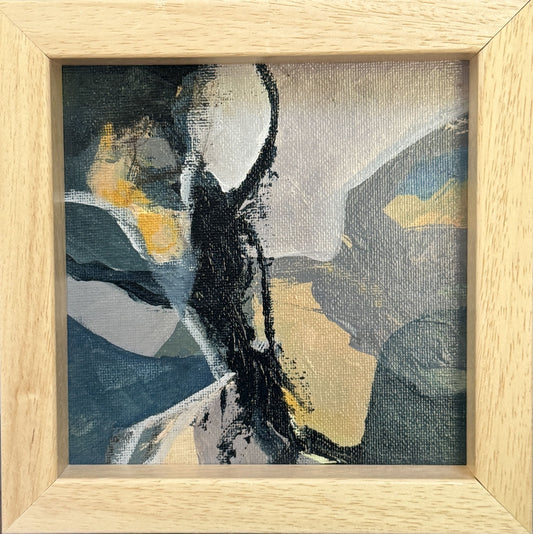 Abstract painting with black, yellow, and gray colors in a wooden frame.